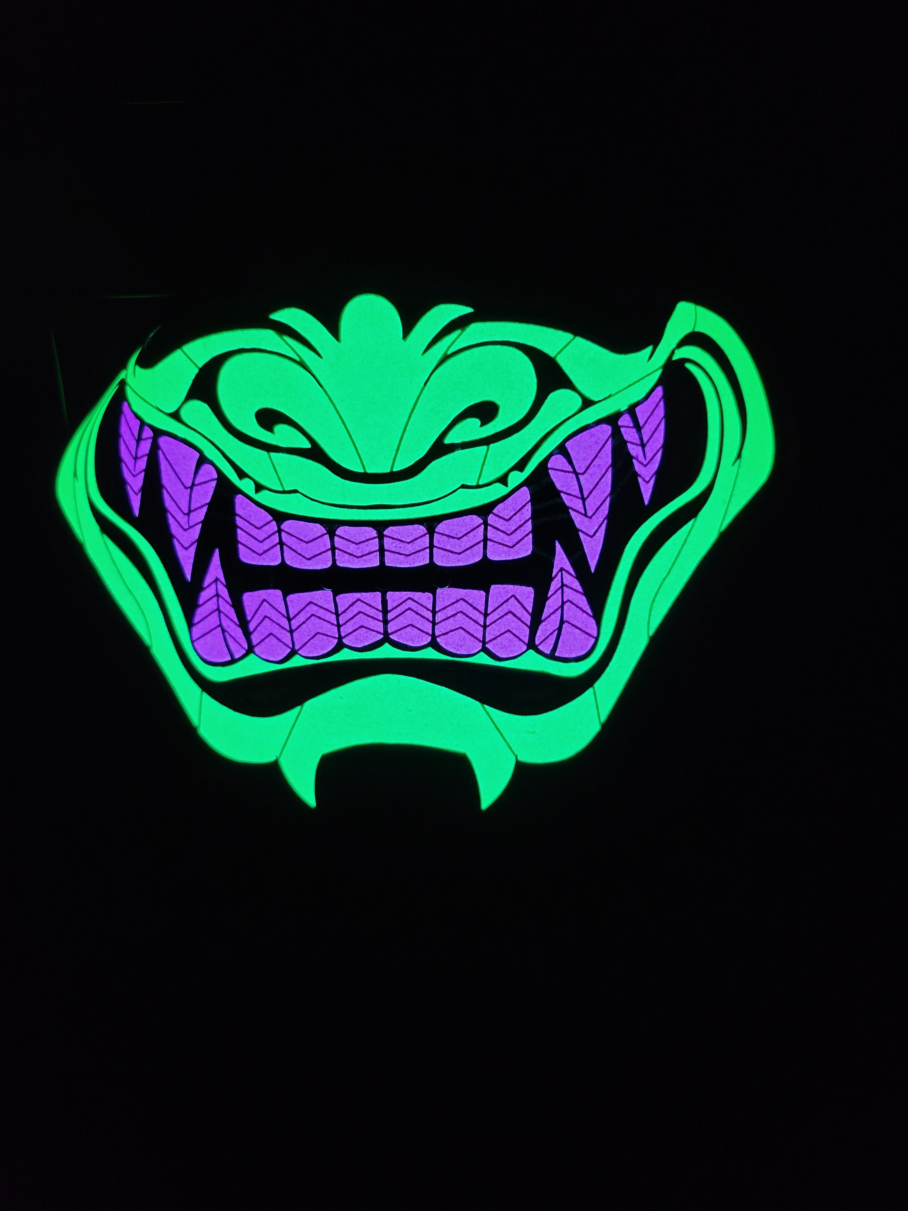 Sound activated green with purple oni mask