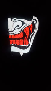 Sound activated white with red oni mask